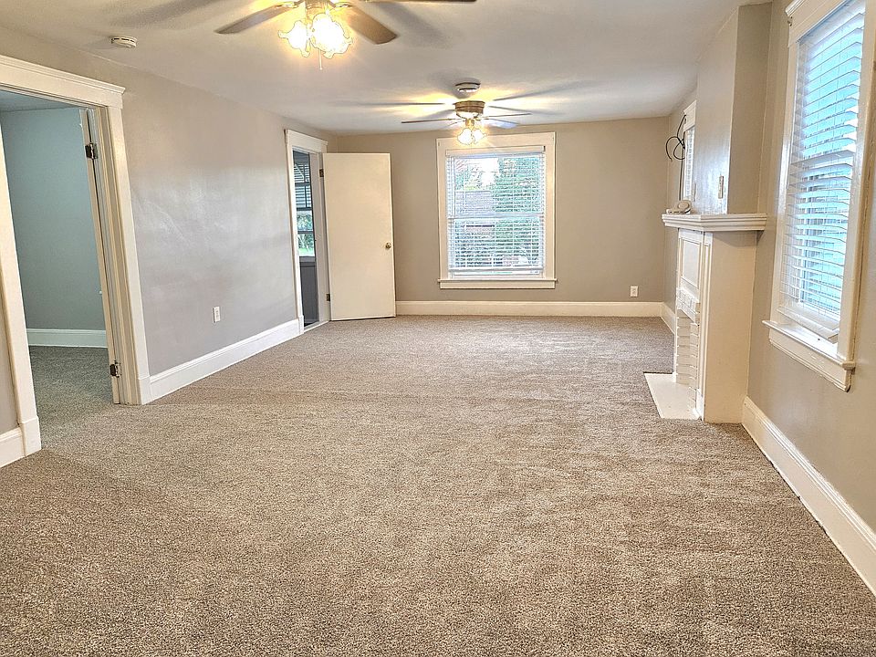Large family room with decorative fireplace