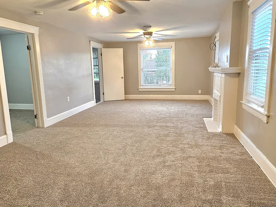 Large family room with decorative fireplace
