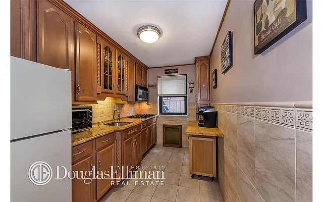 Sold by Douglas Elliman | media 38