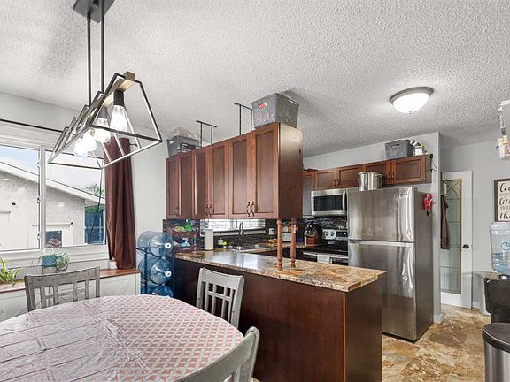 4th image of 9922 S 83rd Ave