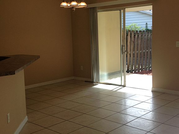 Patio door opens to large backyard