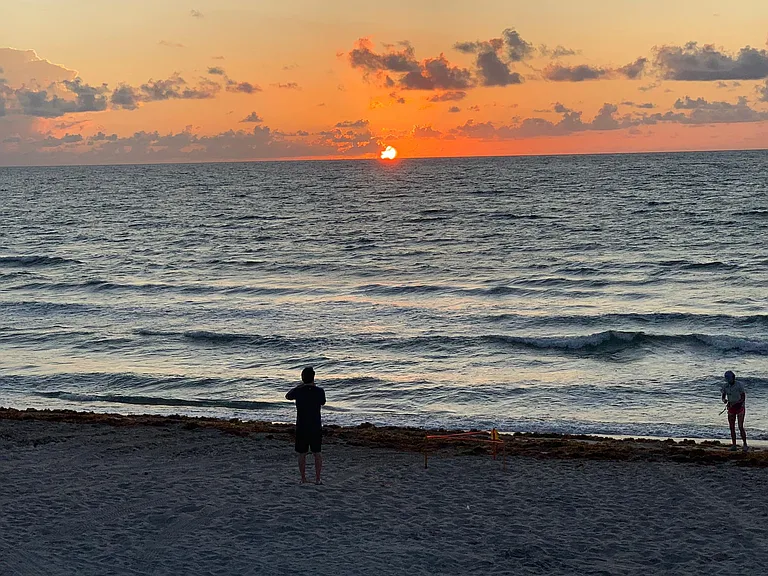 Sun going down at beach 15" walk from apartment.