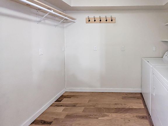 Downstairs apts have an actuall room for laundry/storage/private space. Full sized washer & dryer (3401,3413, 3417)