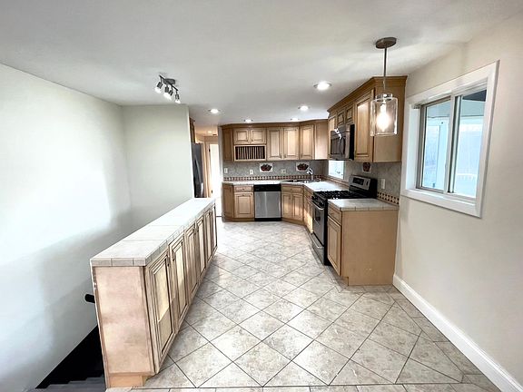 The huge kitchen is a virtual cabinet-a-palooza!