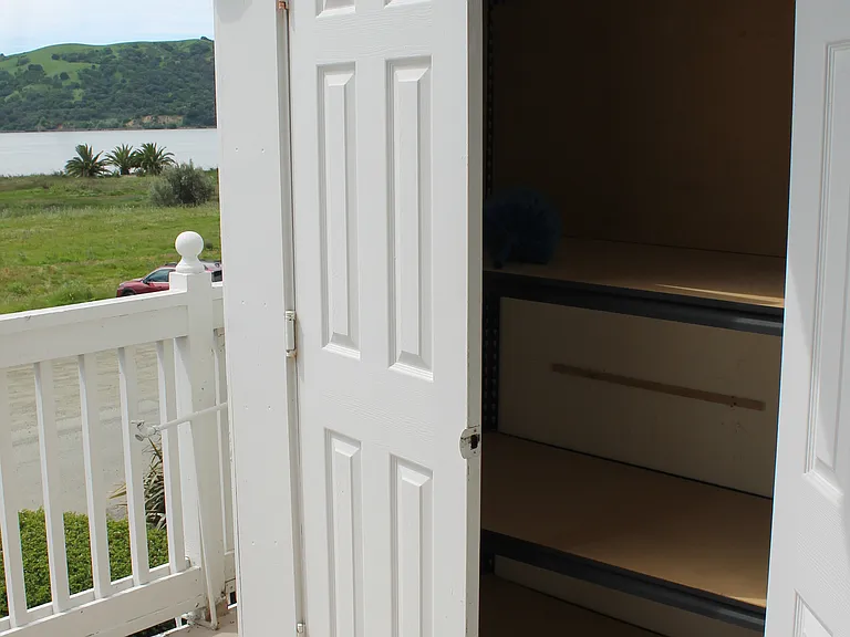Front balcony storage closet