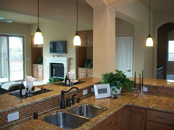 "Truly an entertainers kitchen with double bar/counters which will seat up to 8 guests..."