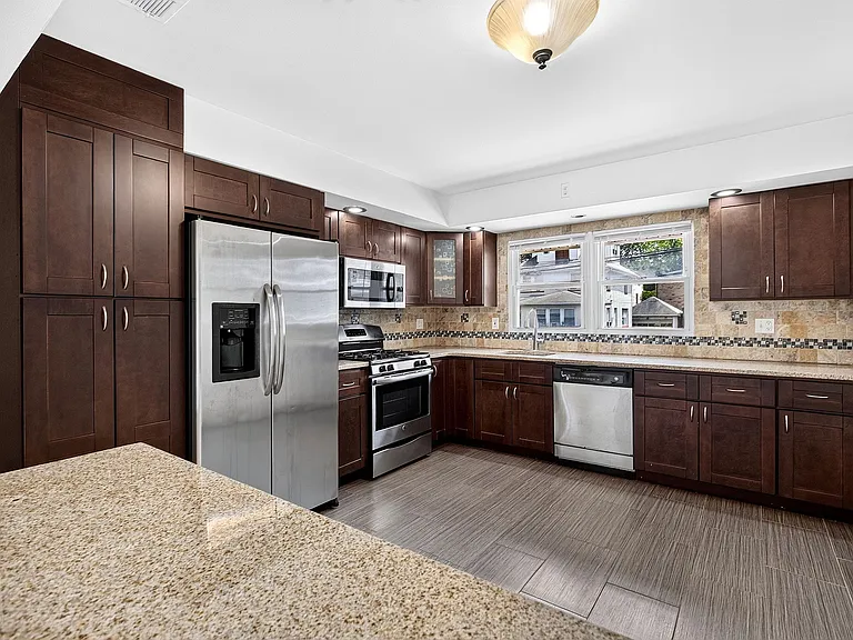 Updated Kitchen with Modern Tile Flooring