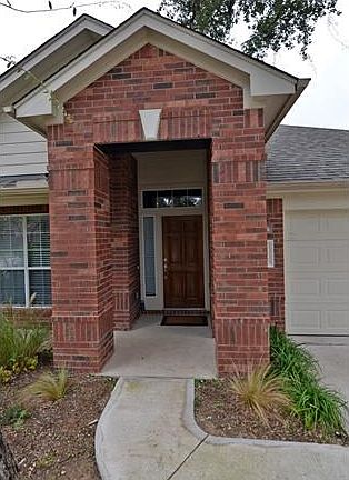 Greet your guests from this covered entry.