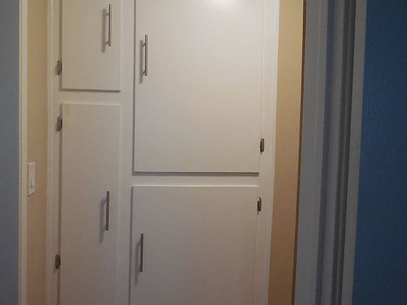 Extra storage cabinets in hallway
