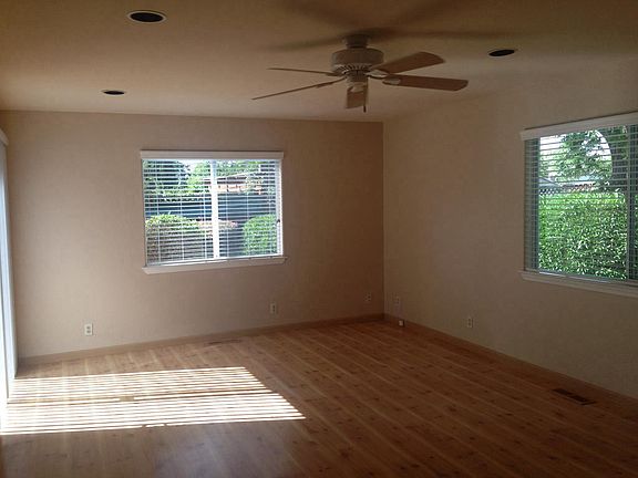 Large family room with access to deck