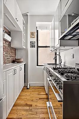 5th image of 321 E 12th St APT 1