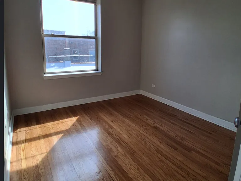 7722 S Cornell Ave — Photo 12