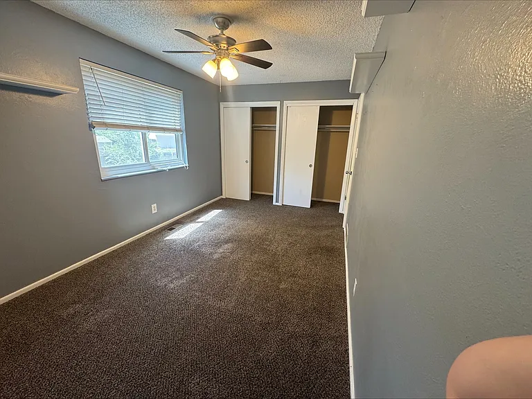 Upstairs 2nd bedroom with double closets