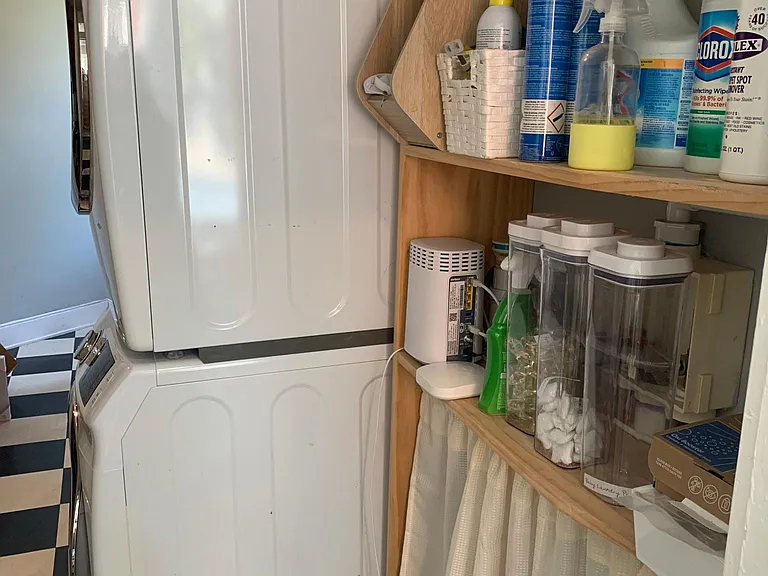 Laundry area, next to rear staircase