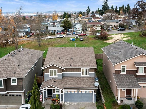Vacant land behind the home offers wonderful privacy.