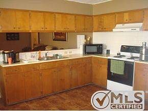 Kitchen open to Cozy Den