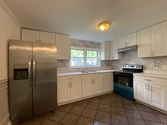 Kitchen with stain steel appliances