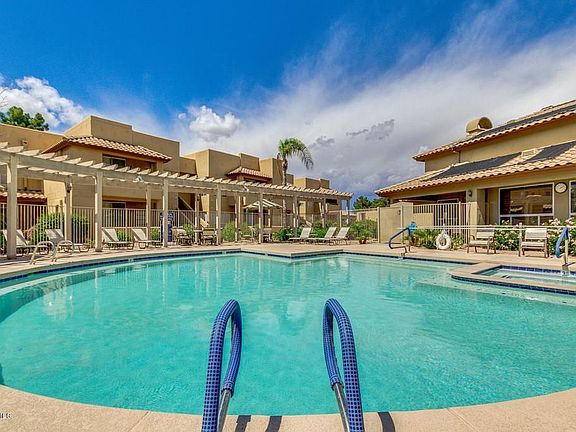 Enjoy 3 pools and 2 hot tubs within steps from the condo. Main pool overlooks the lake for great views!