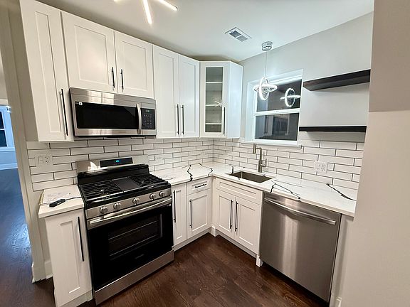 5th image of 5942 W Eastwood Ave #2
