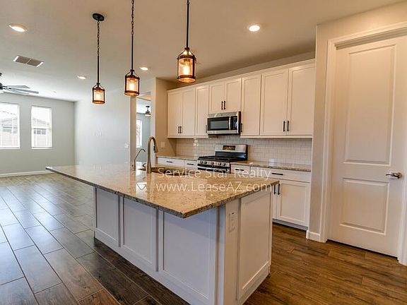 5th image of 9923 E Thornbush Ave