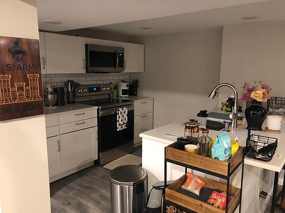 Kitchen with new appliances and cubboards