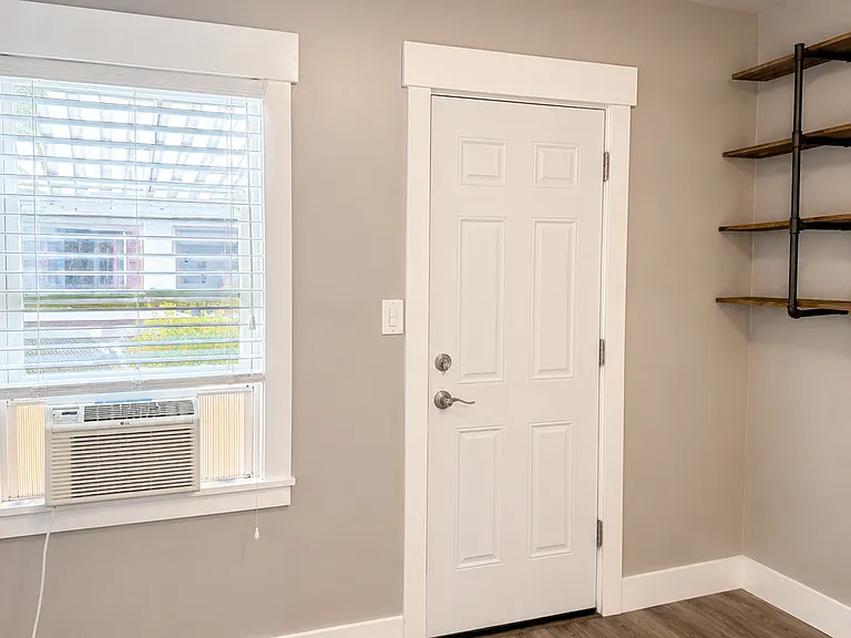 Second bedroom with door to access patio