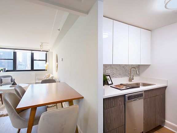 Units Feature Spacious Kitchens with Quartz Countertops