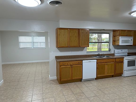 Kitchen and Dining room to left