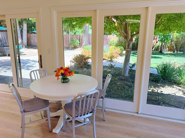 Breakfast area with beautiful backyard view