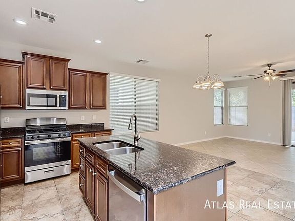 3rd image of 14551 W Port Royale Ln