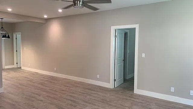 View of living room w/ bedroom #1 on the Right, as seen from the front entry.