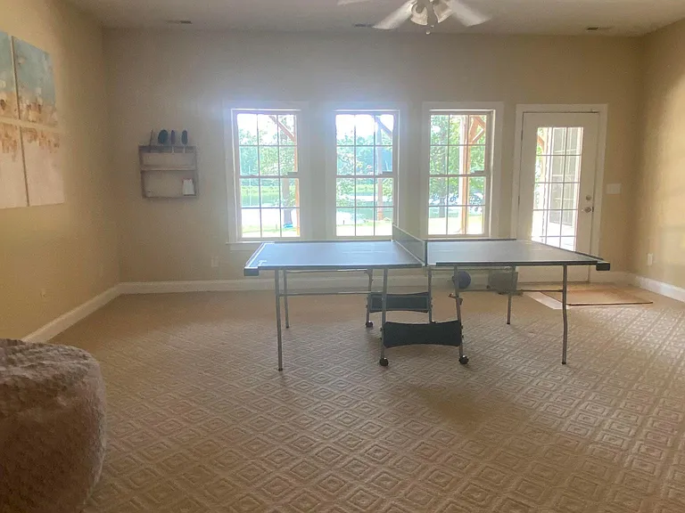 Ping Pong table in walkout basement