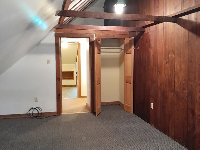 Main living area leading to kitchen