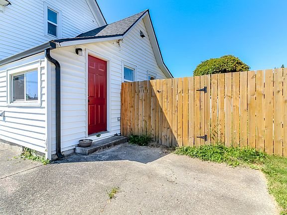 Parking and entry for bottom unit and entry to shared laundry.