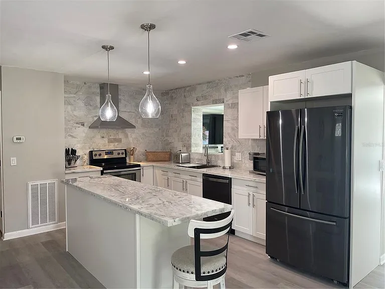 6312 S Lockwood Ridge Rd — Photo 5