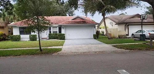 9555 NW 25th Ct Photo 1