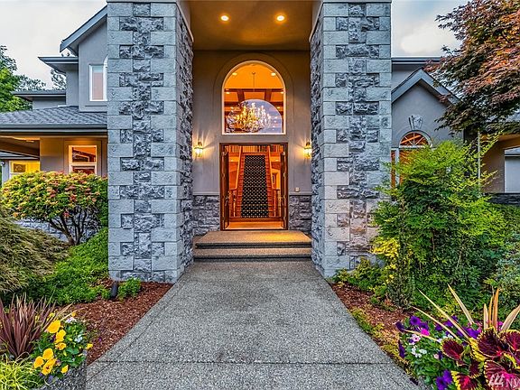 Upon entering the home, you are immediately greeted with a grand staircase underneath a beautiful chandelier. You will love coming home to this every day!