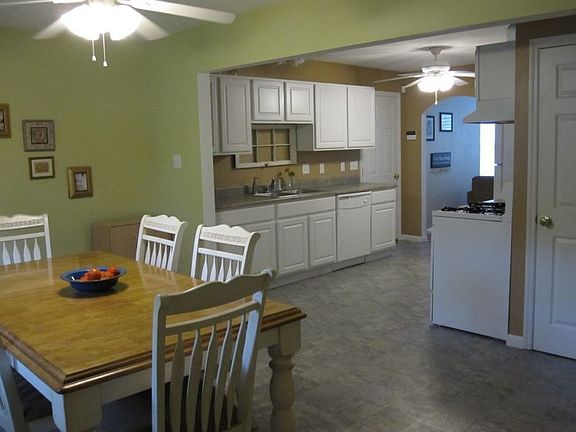A bright, spacious kitchen with gas range awaits!