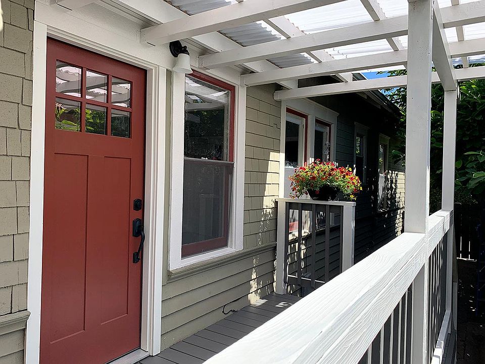 Private entrance with bright covered front porch, perfect for morning coffee.
