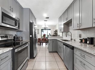 1595 Woodbridge Lakes Circle, West Palm Beach, FL 33406