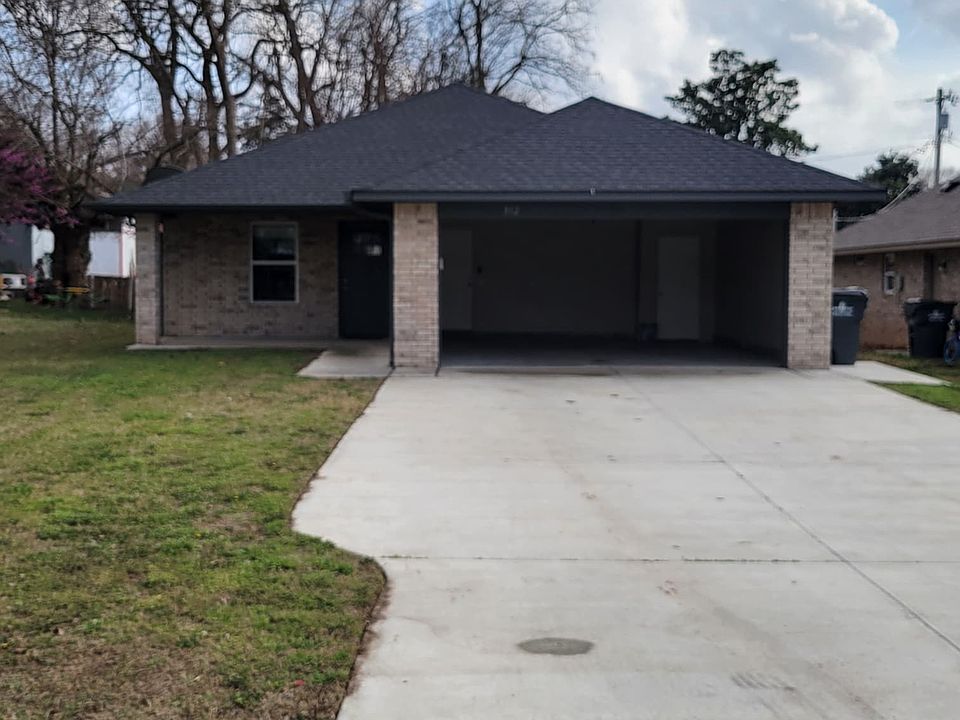 Front of house with 2 car garage with openers