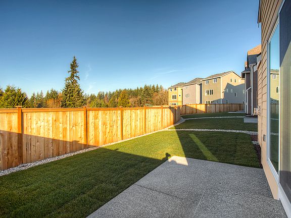 Fenced and landscaped backyard