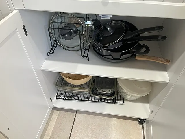 Pots, pans, strainer, salad spinner, bake wear.