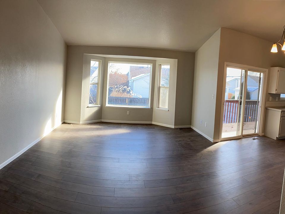 Open floorplan with new flooring & paint.