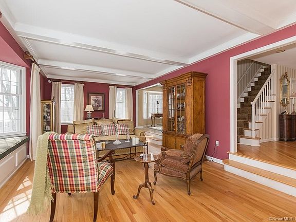 Living room is open to foyer and dining room.