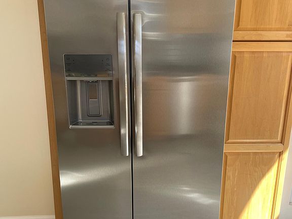 brand new stainless steel refrigerator