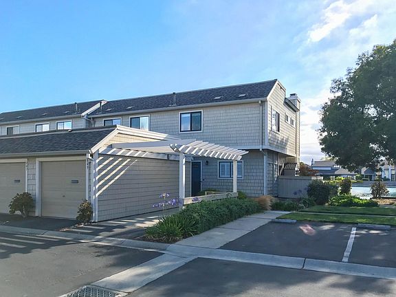 Exterior. Detached garage and carport.