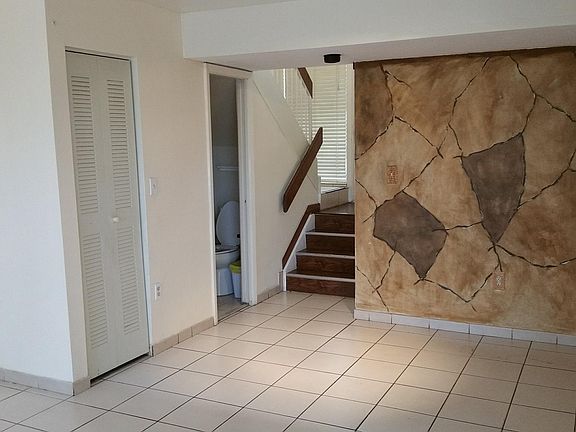 1/2 Bath & Stairs to Entrance & 2nd Floor