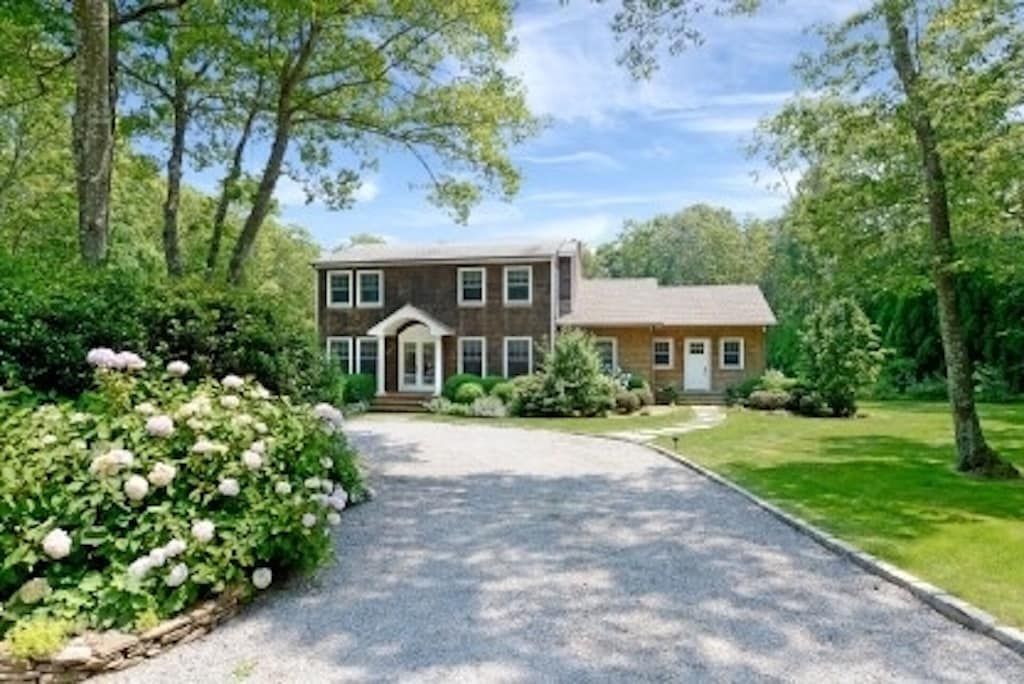  After going through the automatic gate and long private driveway you arrive...