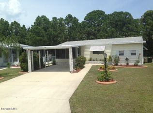 627 Papaya Cir, Barefoot Bay, FL 32976